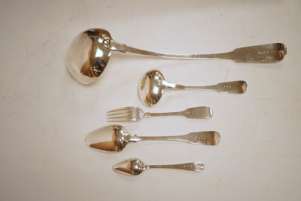 A 19th century matched part canteen of 19th century silver fiddle pattern flatware including a soup ladle and a sauce ladle, twelve table spoons, eight table forks, eight dessert forks, eight dessert spoons and six teasp